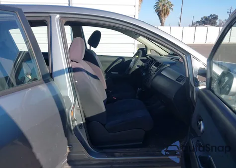 2009 Nissan Versa 1.8S z USA, uszkodzony, nr VIN 3N1BC13E89L423067